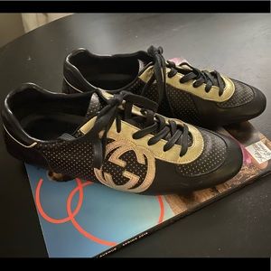 Black and gold Gucci sneakers 37
